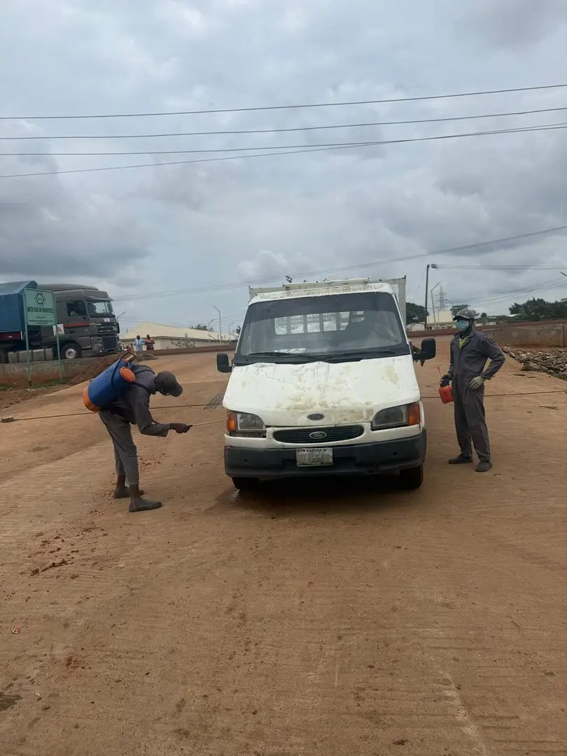 Workers preparing and sanitising a Biotin Feeds delivery vehicle
